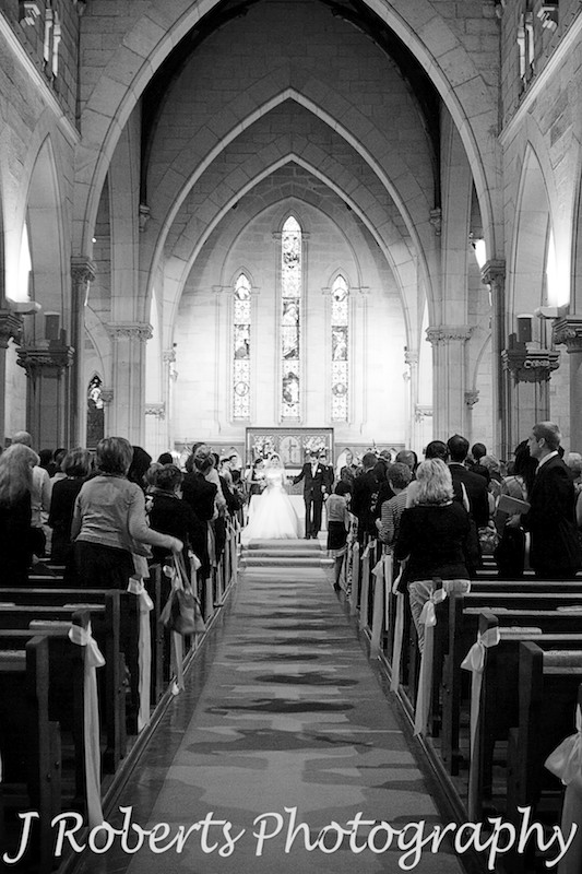 Married couple walk down the aisle at St Thomas' NOrth Sydney - wedding photography sydney